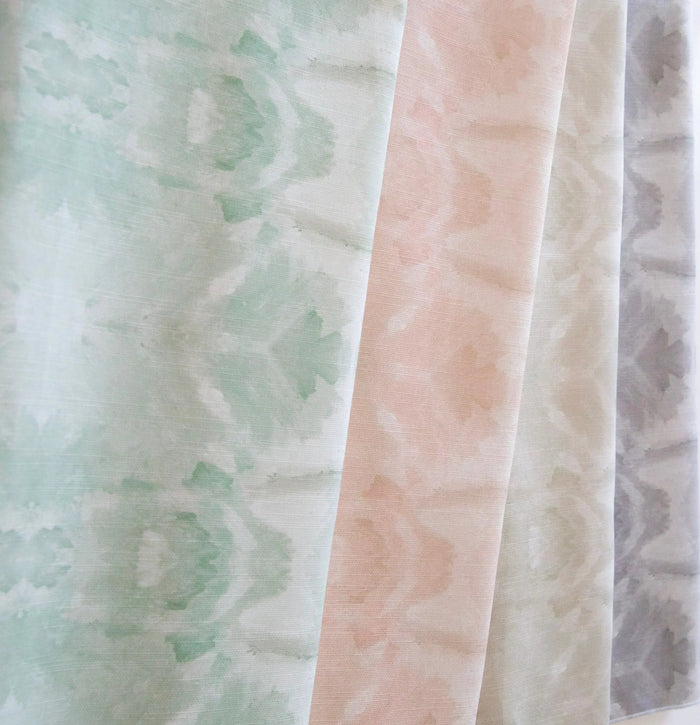 Luxury abstract botanical fabric featuring layered tree-inspired movement in calming jade green and soft neutral tones for collected modern traditional interiors.
