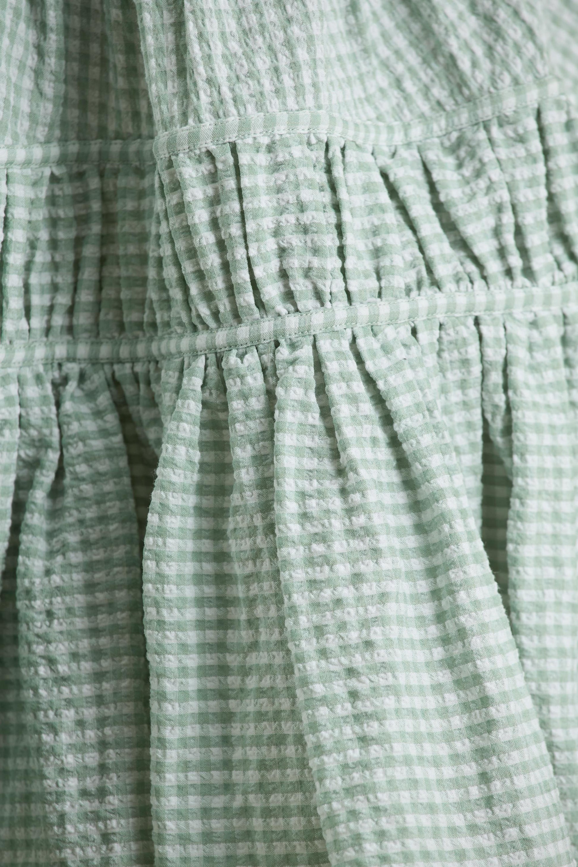 Laurelle | Green Extreme Plunge-Neck Mini Dress With Ruffled Detailing