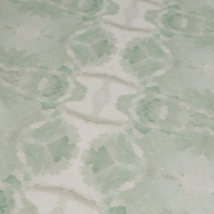Luxury abstract botanical fabric featuring layered tree-inspired movement in calming jade green and soft neutral tones for collected modern traditional interiors.